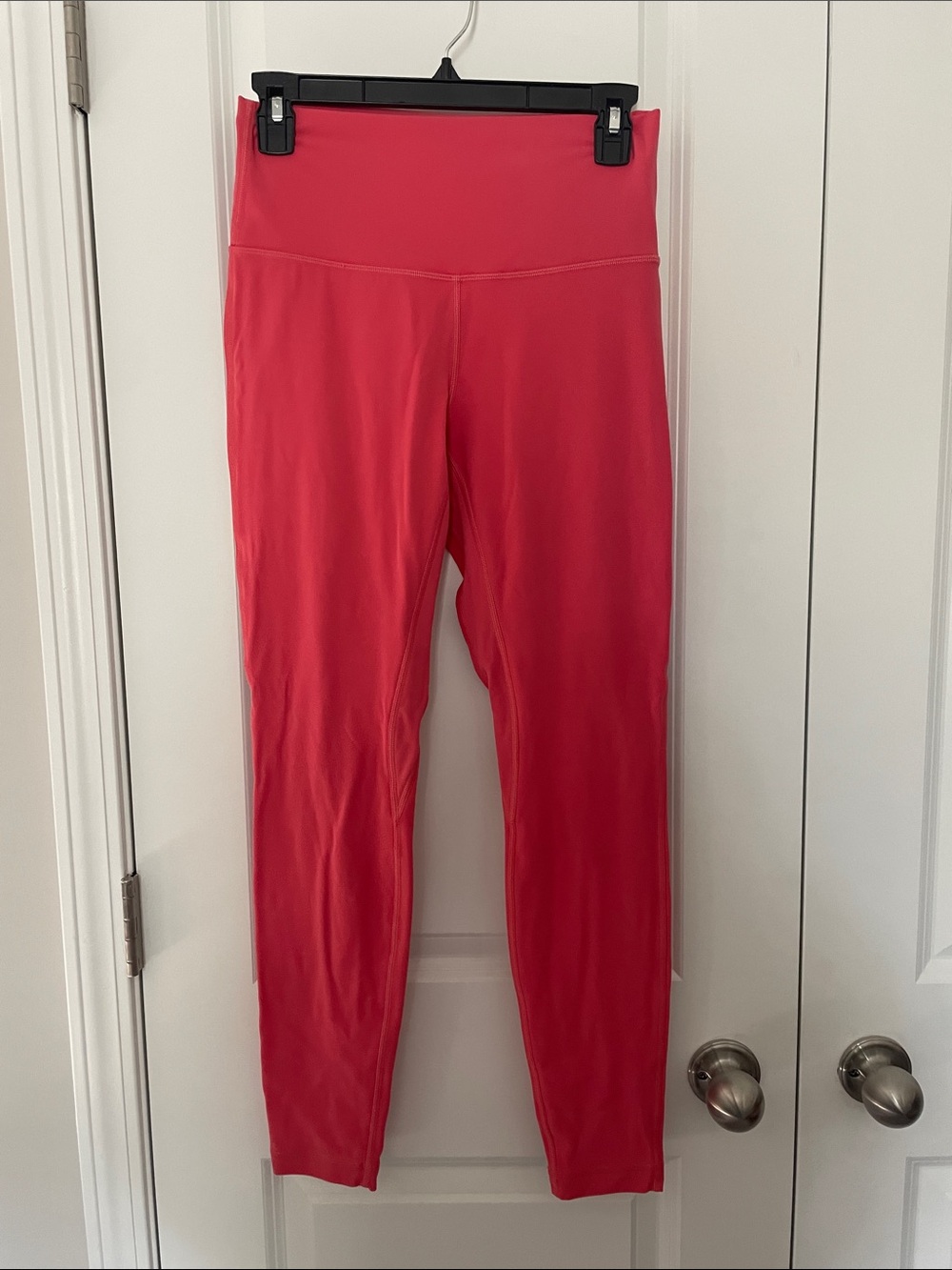 Lululemon High-Rise Performance Leggings in Coral Pink